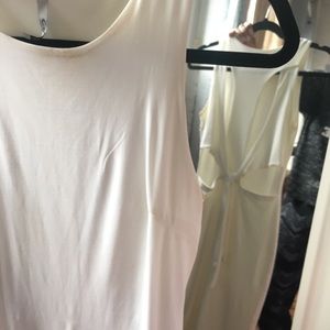 White dress with bow on the back.